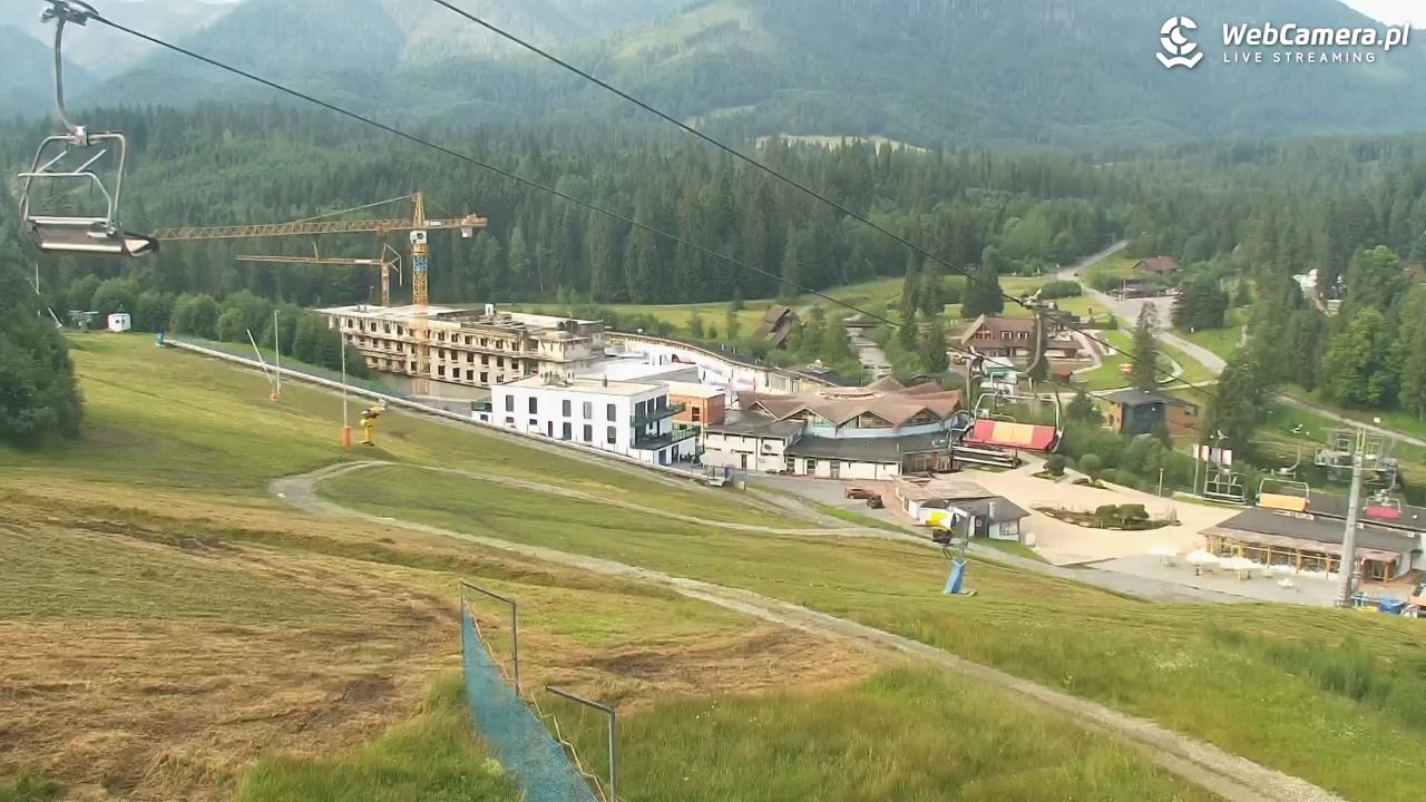 Meander - widok na stok i termy Oravice - 18 lipiec 2026, 08:04